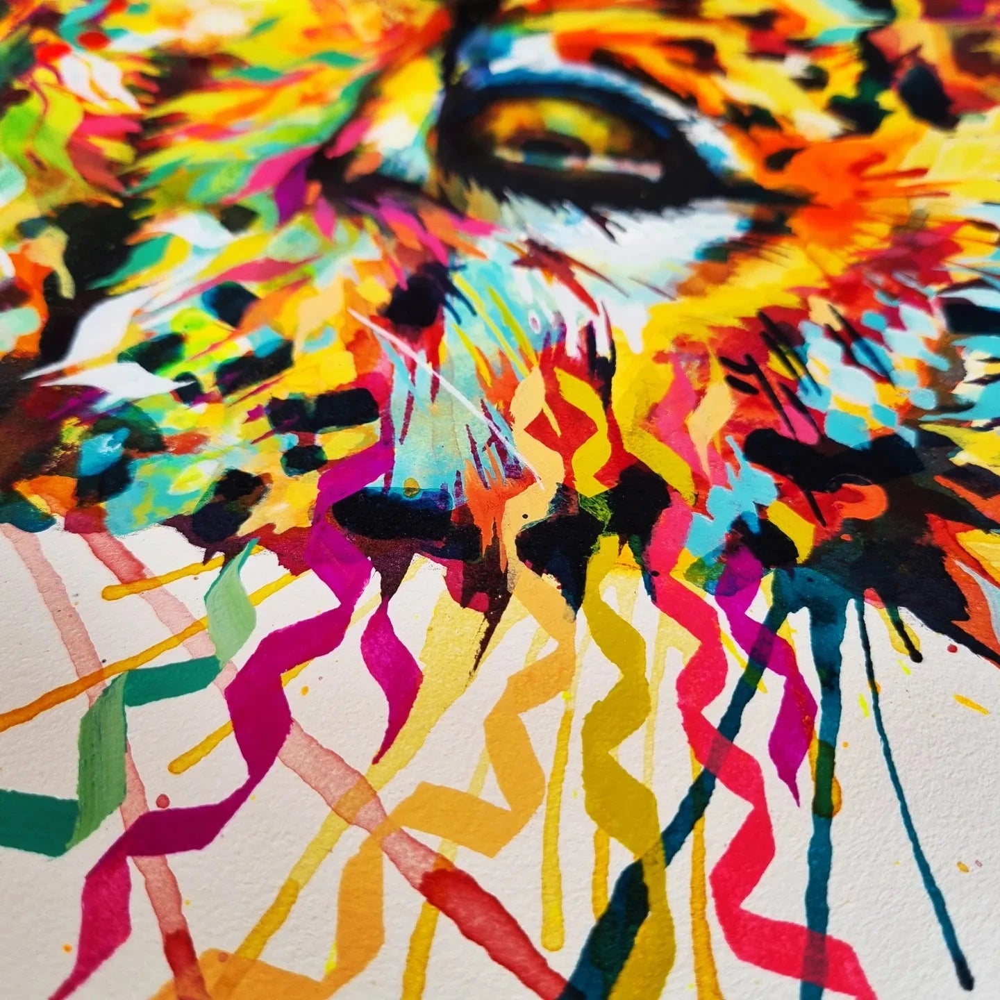 close-up of Sarah Taylor's cheetah painting -showing geometric patterns and eye